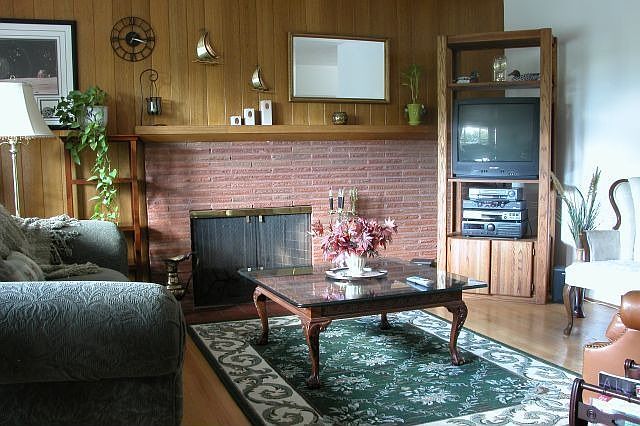 Living Room with Bay Window, Fireplace and Orig. Hardwood Floors