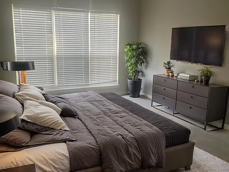 Transform your lifestyle at Riverwood Park Apartments. This spacious bedroom blends comfort and style, featuring modern decor, ample natural light, and a soothing atmosphere. Elevate your everyday livingschedule a tour today!