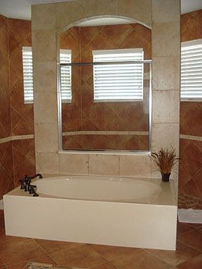 Walk around to double showers, jetted tub