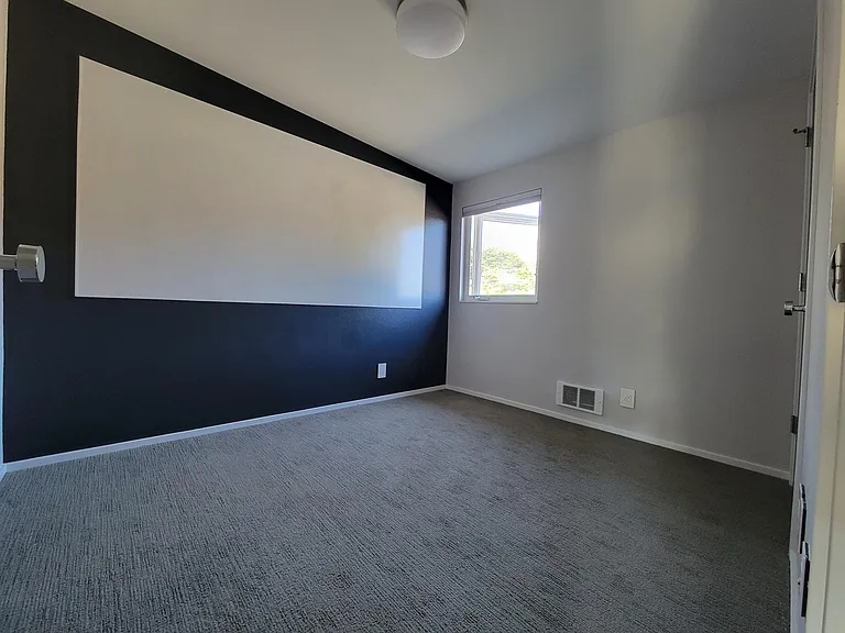 Oversize whiteboard in third bedroom