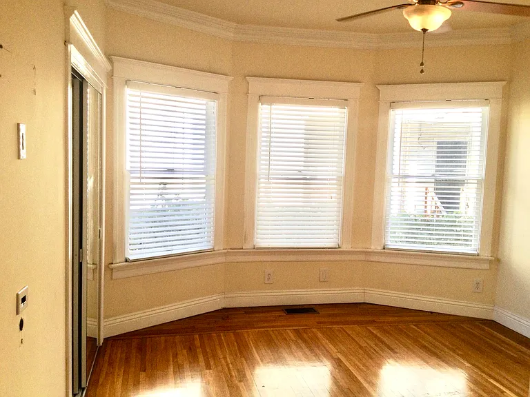 Bright corner study room with bay windows - private USC student space perfect for academic focus