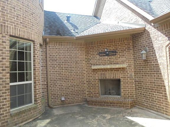 Wonderful front patio area with fireplace, prewire