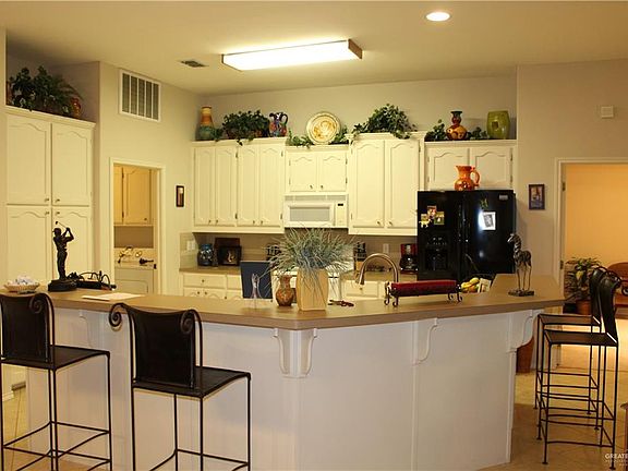 4th image of 3225 Country Club Dr N