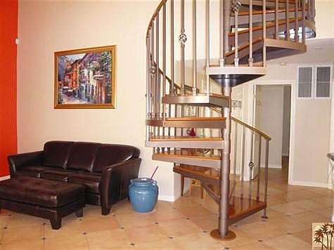 Spiral staircase to master suite.