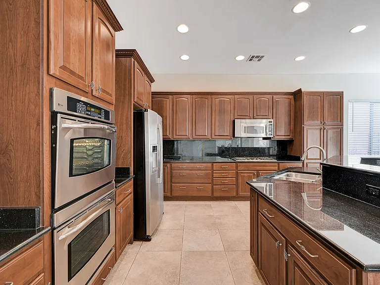 6761 Clay Tablet St — Photo 48