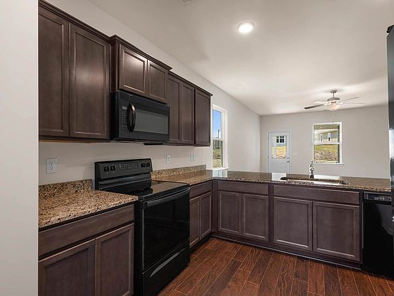 The kitchen comes with a full suite of energy-efficient appliances