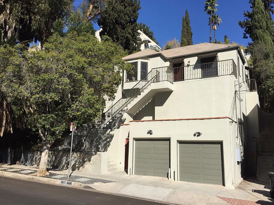 Street parking + 1 car garage. Private stairway and balcony.