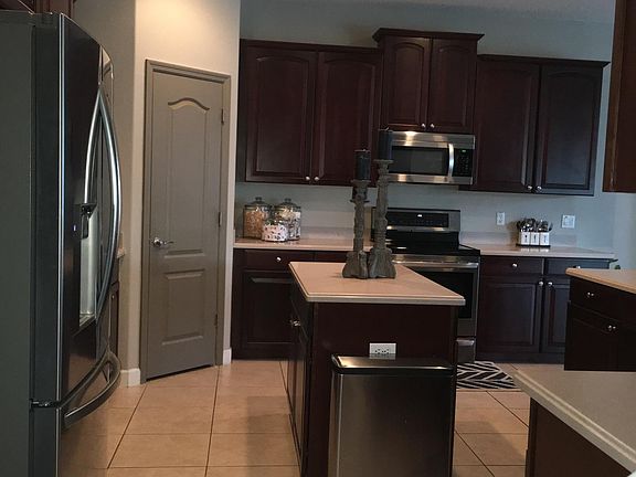 Large kitchen. stainless appliances, pantry, island & garage access