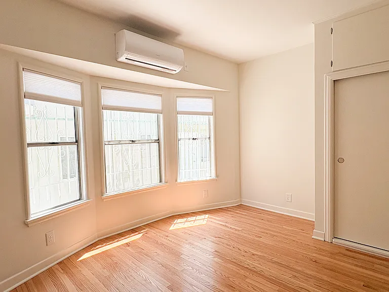 Second bedroom with bay windows