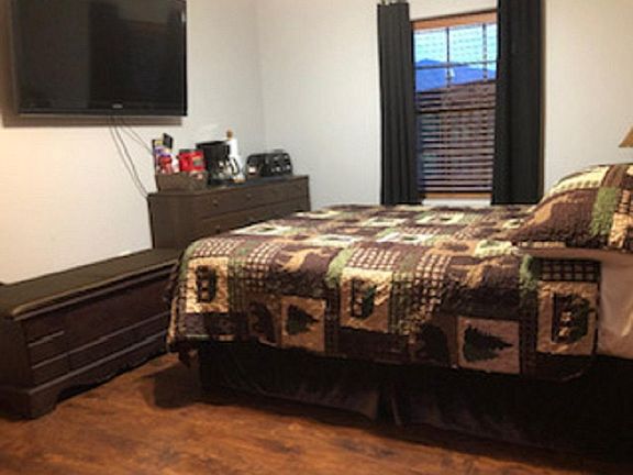 Bedroom with adjoining bathroom.