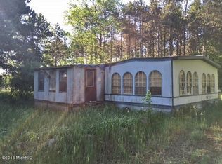 16363 Tamarack Rd, Howard City, MI 49329