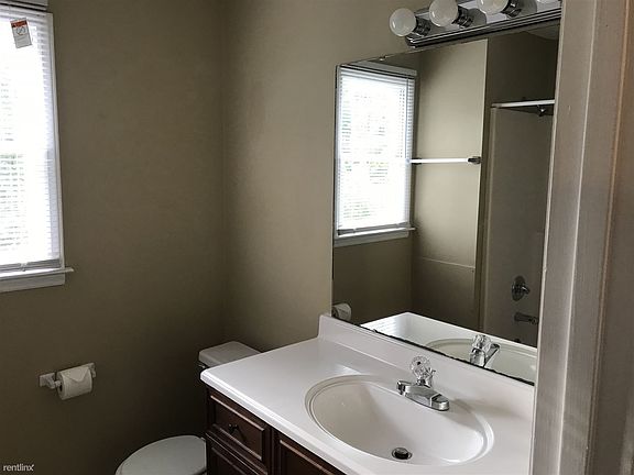 New vanities and light fixtures in both bathrooms