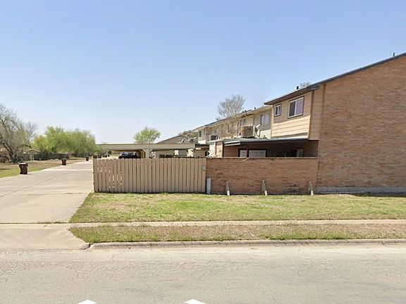 Back of complex where carport is