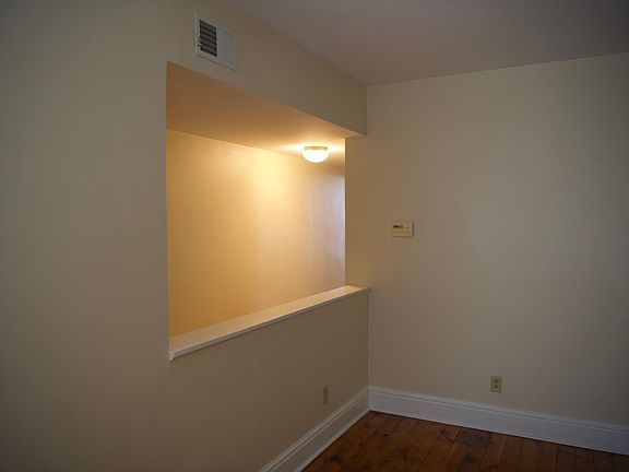 Living room with opening over looking private entrance