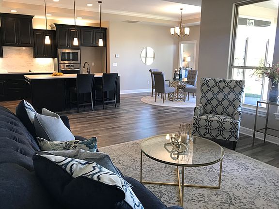 Living area with easy access to kitchen and outdoor living space