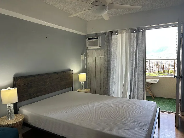 Bedroom opens up to Mountain Side Patio.
