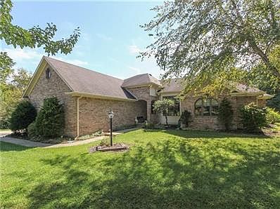 Brick Ranch with Finished Basement and 3+Car finished Garage with Attic Access and Service Door.