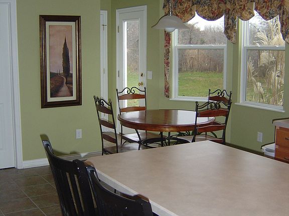 Eat in Kitchen with a bay wall