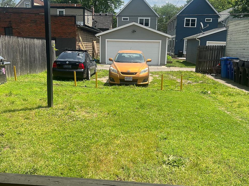 View from the porch to the alley. The open space on the right is the parking space for this space!
