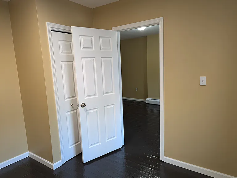 First bedroom with closet (looking into living room)