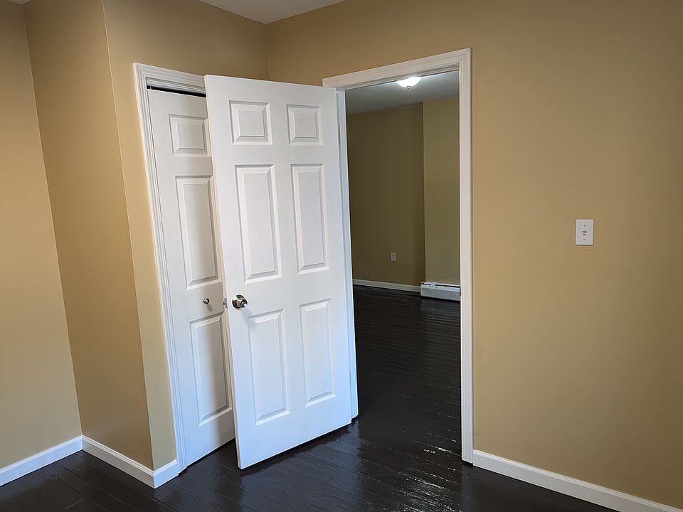 First bedroom with closet (looking into living room)