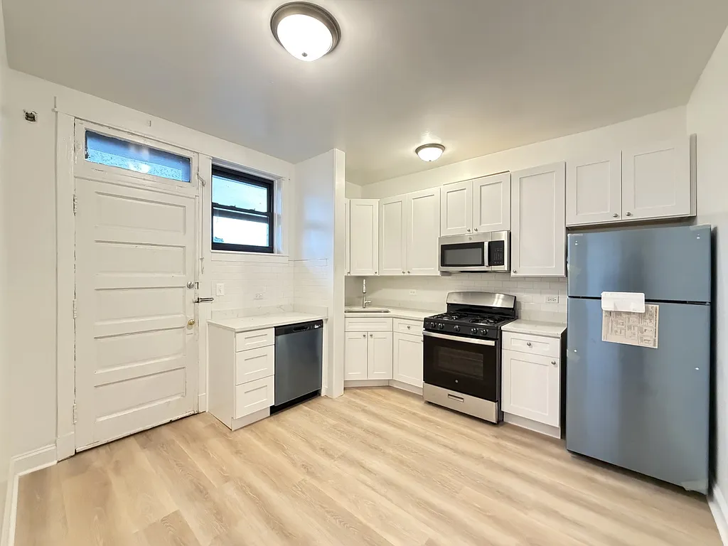 Appealing 2 Bed, 1 Bath at Milwaukee + Sawyer (Logan Square) — Photo 2