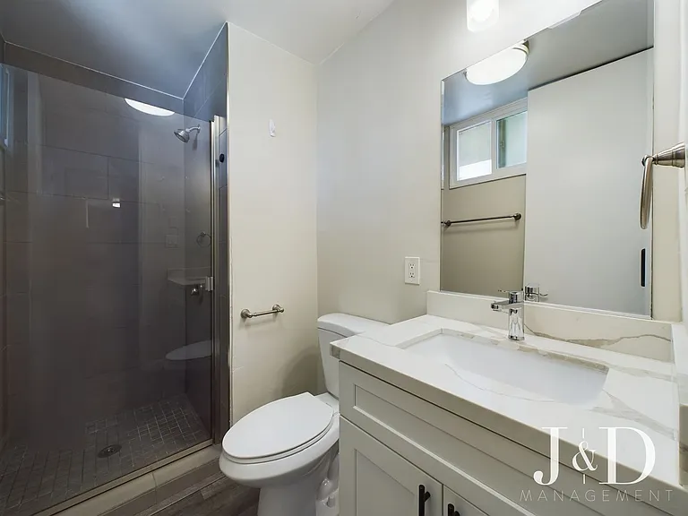 Newly Renovated Units Near the Beach with Parking — Photo 24