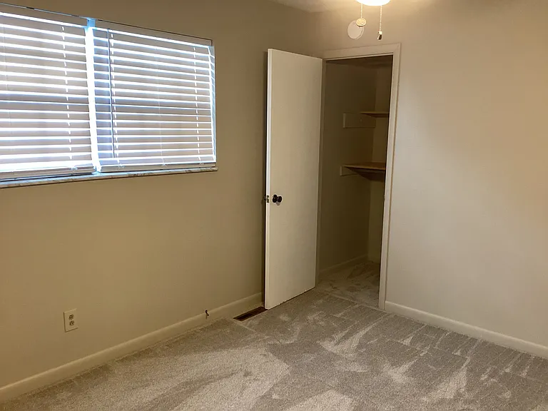 Front bedroom with one of two closets