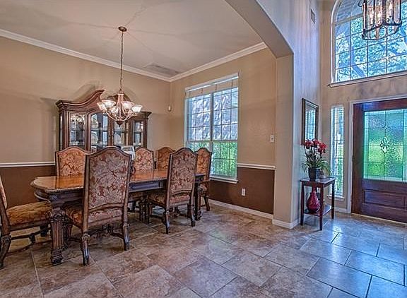 Over sized foyer opens up to formal dining and sitting room.