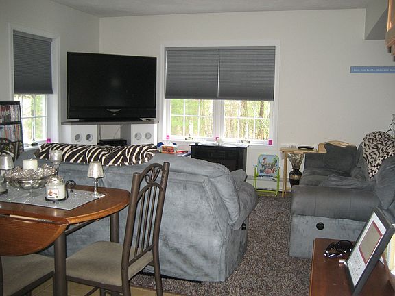 LARGE BASEMENT WITH FULL SIZE WINDOWS, PLEATED FABRIC SHADES, CERAMIC TILE 