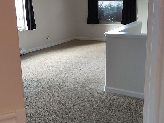 view of living/dining room from kitchen entrance