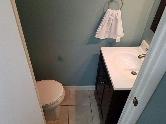 1/2 Bath Downstairs off of Laundry Room