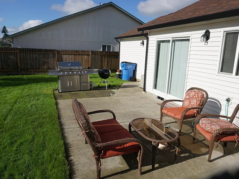 backyard patio which now has a cover and 
Patio lights