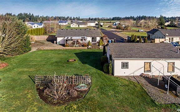 Rear view of garage/shop and home
