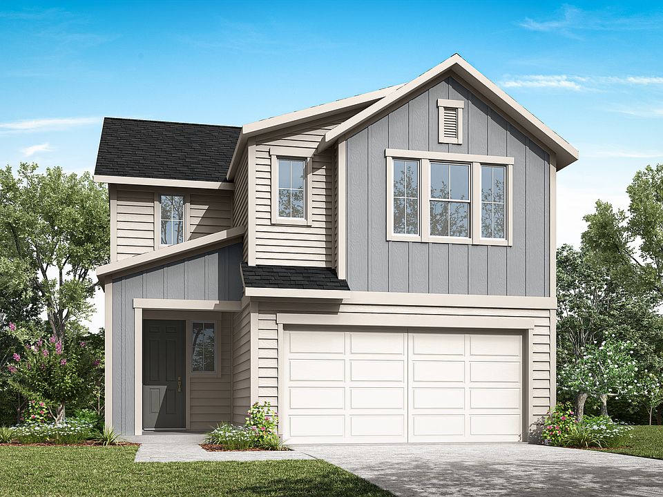 A two-story house with a garage, surrounded by lush greenery and a clear blue sky, stands prominentl