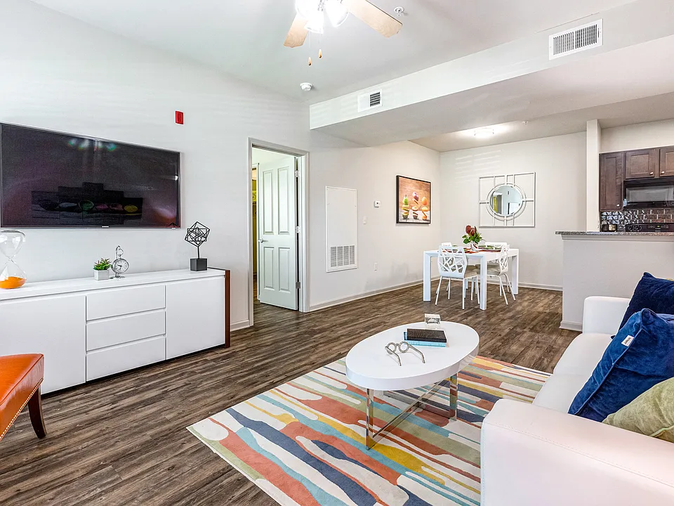 Model living room with wood-designed flooring