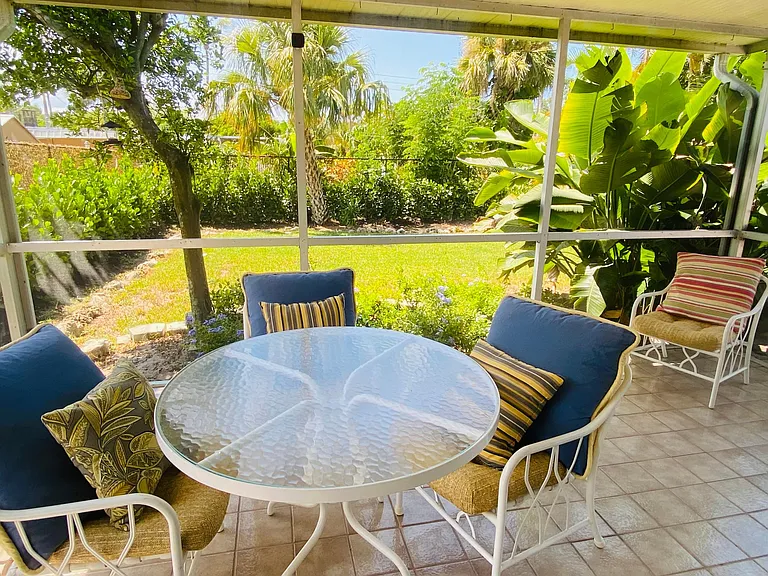 Lanai and fully enclosed backyard.