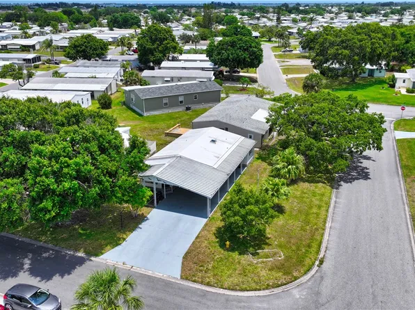 821 Bougainvillea Cir, Barefoot Bay, FL 32976