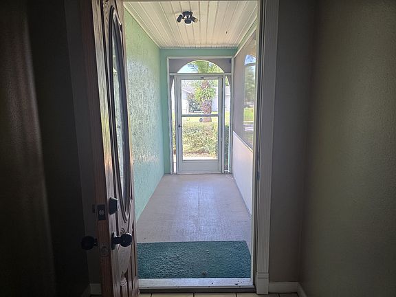 Front door and screened entryway