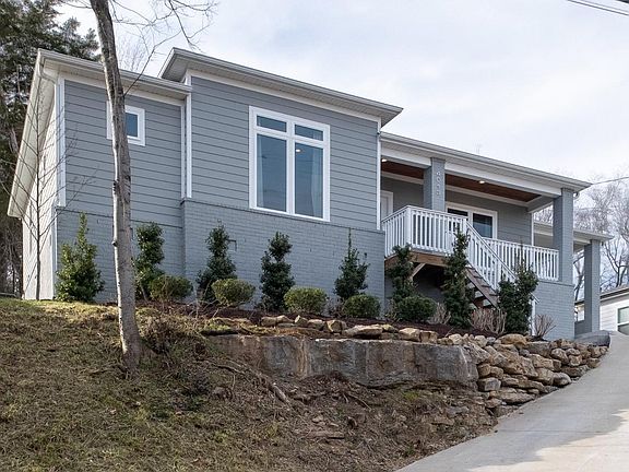 Curb appeal! And your own private front porch with a view!