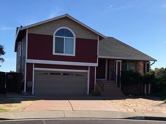 Front of the house. Garage and driveway parking, along with plenty of street parking in the cultesac.