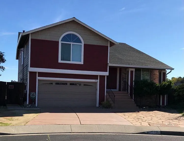 Front of the house. Garage and driveway parking, along with plenty of street parking in the cultesac.