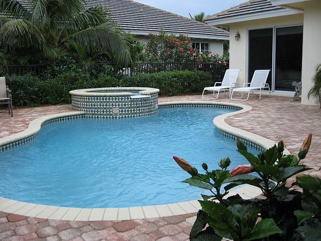 Sensational courtyard, maintenance free living means ditch your lawn mower!
