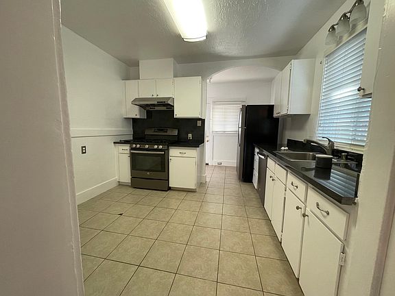 Kitchen, gas stove with huge pantry