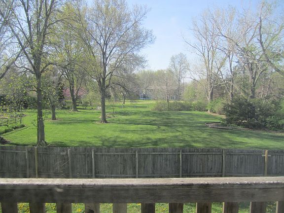 View out back, fence and deck replaced