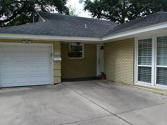 NOTE THE NICE DOUBLE WIDE DRIVEWAY. AN AUTOMATIC GARAGE DOOR WAS INSTALLED IN 2011.