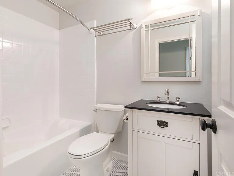Full bath on second floor hallway.