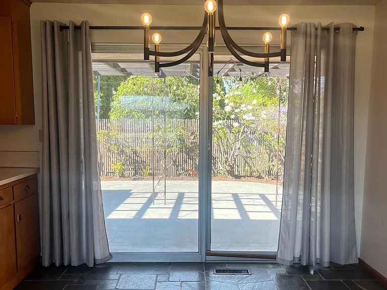 Dining room with sliding door to entertaining patio