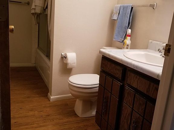 2 full bathrooms with new flooring and paint .
