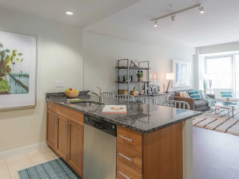 Asteria Kitchen and Dining Area with Floor-to-Ceiling Windows